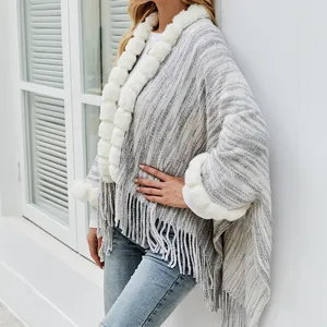 Elegant warm knitted shawl with faux fur collar and fringe detail for women