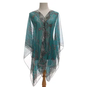 Copricostume in chiffon color teal con eleganti motivi a catena e leopardati