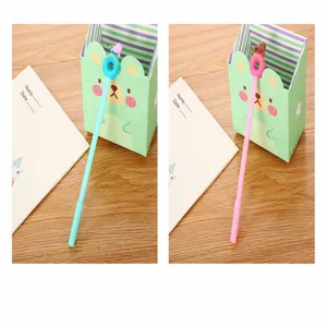 Detail view of cartoon polar bear donut gel pens in light blue and pink styles