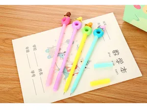 Close-up view of cute cartoon polar bear and donut toppers on student colorful gel pens