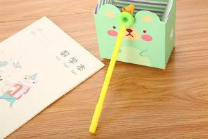 Detailed view of cute cartoon polar bear donut gel pen in office setting