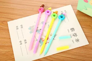 Macro detail of colorful cartoon polar bear donut gel pens on a notebook.