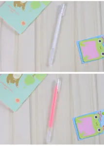 Detalle macro de bolígrafos pastel de alta capacidad en blanco y rosa para diario DIY