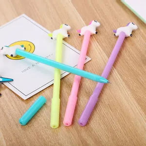 Lot de quatre stylos gel licorne mignons aux couleurs pastel avec encre noire scolaire