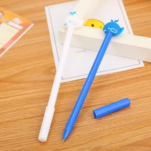 Two cute cartoon whale gel pens with soft silicone toppers for school and office
