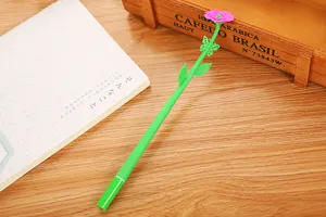 Detailed view of creative green flower gel pen with a pink blossom and butterfly detail