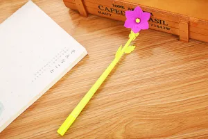 Creative purple flower-shaped gel pen with yellow stem for school stationery.