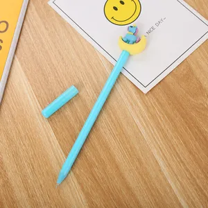 Stylo gel bleu mignon avec une lune jaune 3D et une figurine de licorne pour école.