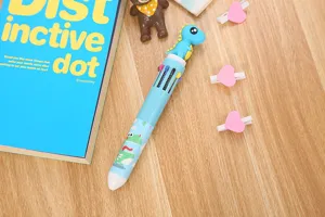 Détail d'un stylo à bille rétractable 10 couleurs avec mignon dinosaure bleu