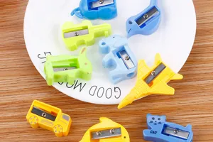 Detailed view of assorted cartoon animal and vehicle shaped pencil sharpeners