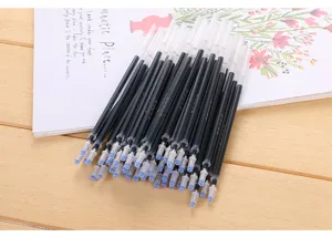 Close-up of black disappearing ink refills for magic handwriting practice stationery.
