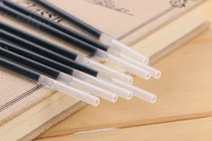 Close-up view of black pen refills with transparent tips for disappearing ink pens.