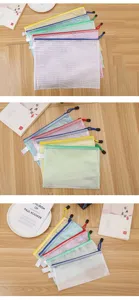 Set of colorful A4 mesh zipper file bags for school and office document storage