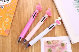 Detail view of cute flamingo toppers on multi-color 6-in-1 stationery ballpoint pens