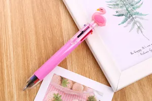 Detailed view of a cute pink flamingo topper 6-color ballpoint pen for creative journaling