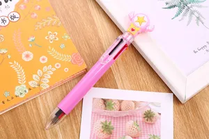 Close-up of cute 6-color ballpoint pen with magical wand star topper