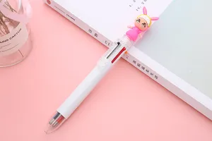 Detailed view of 6-color ballpoint pen with a cute cartoon character on pink background.