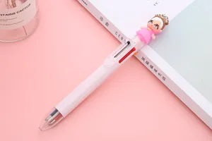 Detail of a 6-color ballpoint pen with a cute pink cartoon girl topper on pink background.