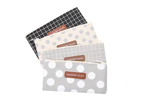 Set of four Oxford cloth pencil cases with unique patterns and leather-like patches