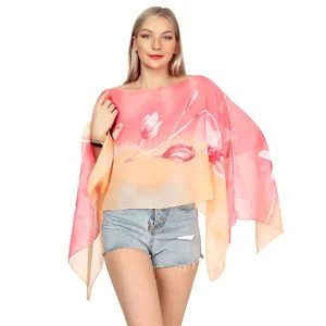 Lightweight chiffon shawl featuring a vibrant pink floral print and button detail
