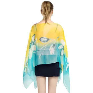 Yellow and blue floral chiffon shawl for summer sun protection on model back view