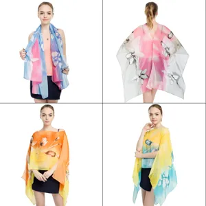 Lightweight floral print chiffon shawl and scarf with button detail for summer sun protection.