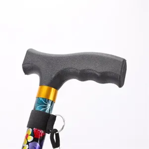 Ergonomic folding walking stick handle for elderly, sturdy design with comfortable grip.