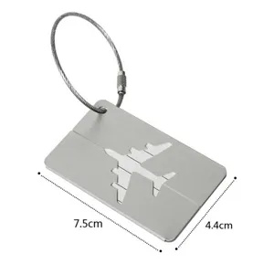Aluminum luggage tag detail showing the airplane cutout shape and clear dimensions.