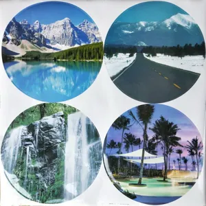 Decorative circular landscape sticker set featuring mountain lake, snowy road, waterfall.