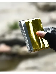 Manta térmica de emergencia para supervivencia en camping al aire libre y senderismo.
