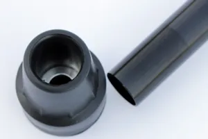 Replacement black rubber crutch tip and metal cane tube for elderly walking aids.