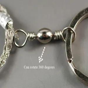 Détail du pivot de scie à fil en acier inoxydable, outil de survie EDC rotatif à 360°.