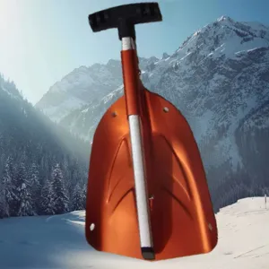 Dettaglio pala da neve pieghevole portatile, lama in alluminio arancione, manico robusto.