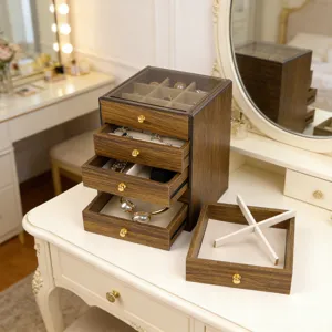 Luxury multi-layer wooden jewelry organizer box with acrylic top lid shown on vanity