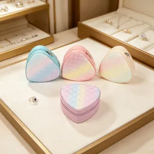 Detailed view of pastel rainbow checkered mini jewelry boxes in a store display