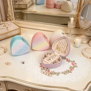 Detailed view of multiple heart-shaped jewelry boxes with organized interior compartments