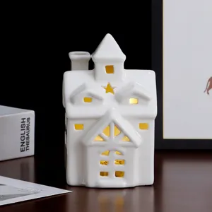 Witte keramieken huis nachtlampje LED holle kandelaar kerstdecoratie voor thuis.