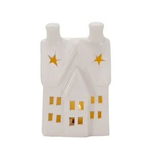 Witte keramische kerst holle huis nachtlampje en kandelaar huisdecoratie ornament.