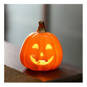 Halloween keramische pompoen LED licht ornament, holle en griezelige bureaudecoratie rekwisiet.