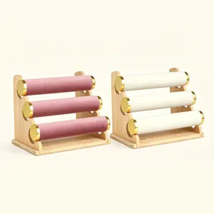 3-stufiger Armbandständer aus Holz mit Samtrollen und goldenen Metallkappen