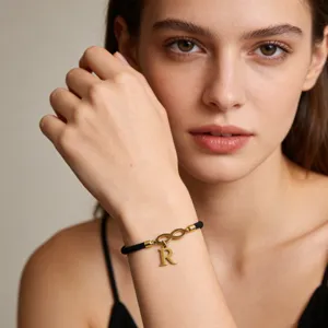 Handmade black cord infinity bracelet with gold letter R pendant for couple jewelry fashion gift
