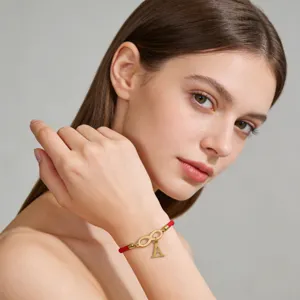 Handmade red string bracelet with infinity symbol and letter A charm for couples stylish accessory