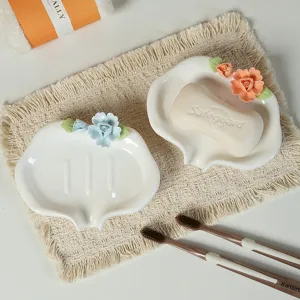 Luxury ceramic soap dish with drainage and 3D floral rose design for bathroom sink.