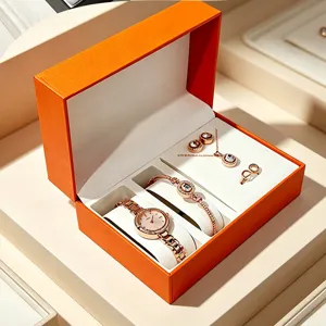 Juego completo de joyas en oro rosa con reloj y pulsera en caja de regalo naranja
