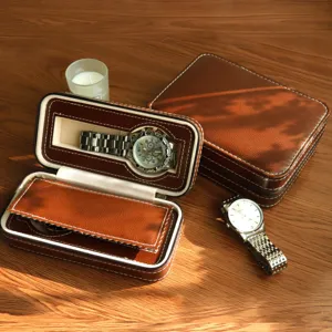 Premium brown leather watch storage case detail with zipper closure and soft lining