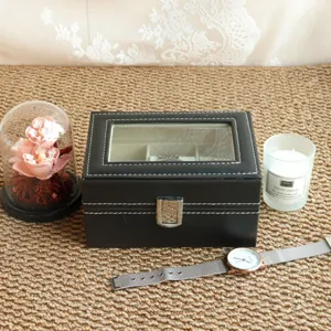 Premium black leather watch storage box with transparent window and metal clasp detail