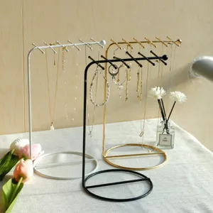 Iron jewelry display stands in gold black and white for necklace and bracelet organization
