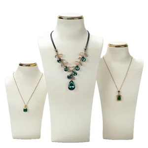 Three white brushed leather mannequin busts for professional jewelry necklace display