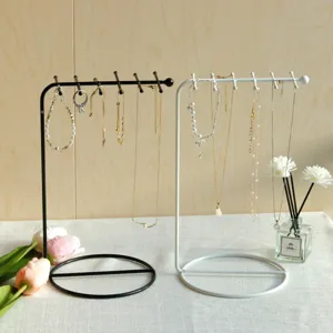 Minimalist iron jewelry display stand for necklaces and bracelets in black and white colors
