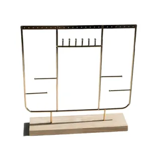 Premium gold metal jewelry display stand with solid wood base for earrings and necklaces